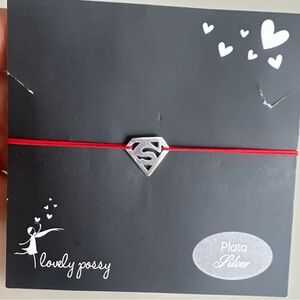 Small Superman logo sterling silver bracelet with red adjustable thread